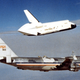 The first shuttle, Enterprise, separates from the Shuttle Carrier Aircraft for glide testing. An aerodynamic cone covers the rear engines. (NASA)